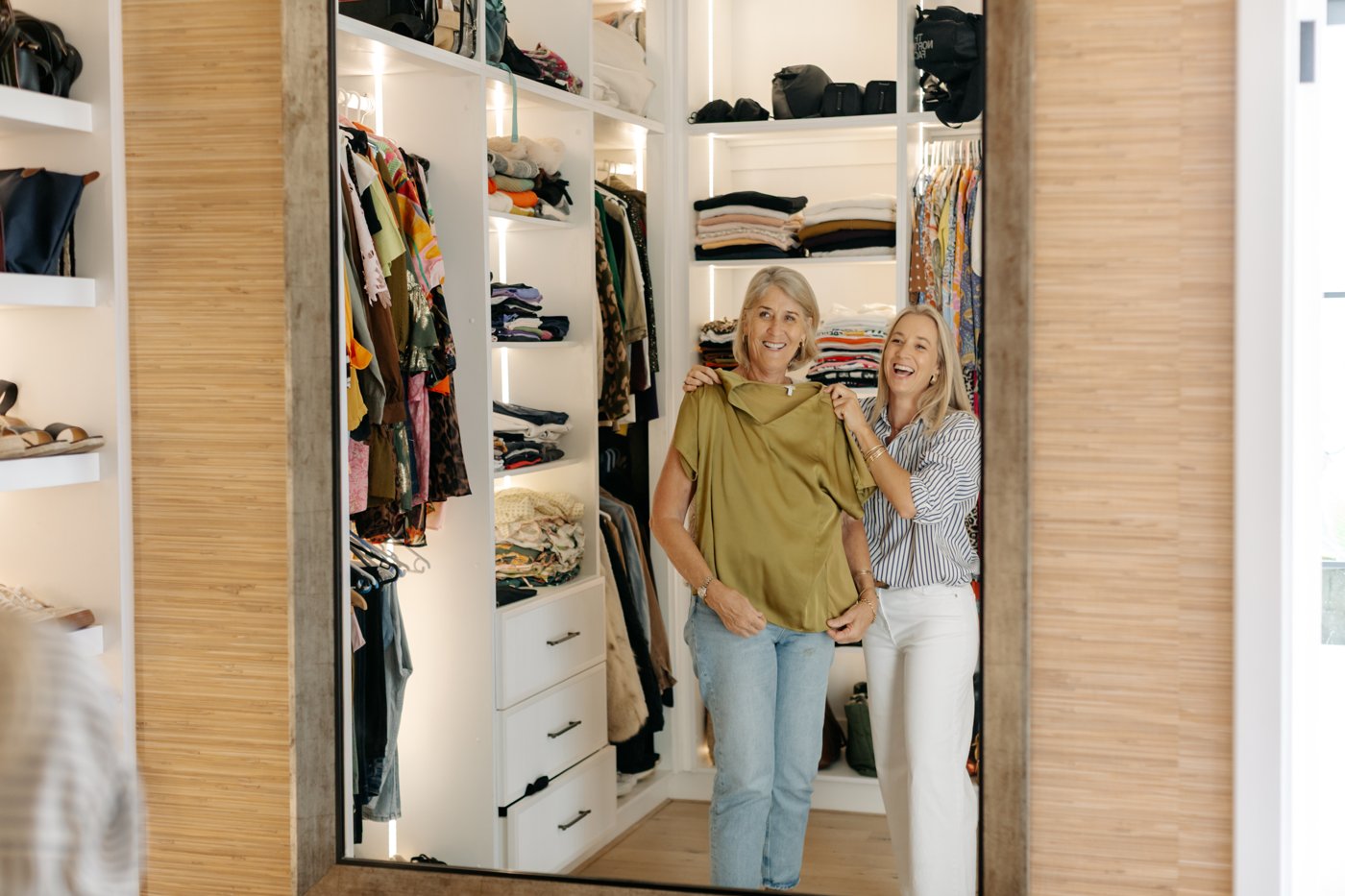 Sarah Reuter editing a client's wardrobe together